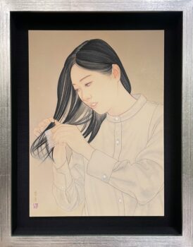 髪を梳く